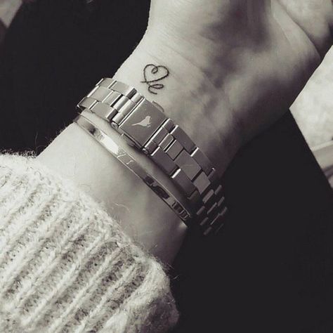 Letter E Tattoo, Wrist Tattoos Quotes, Tattoo On Wrist, Meaningful Wrist Tattoos, L Tattoo, Shape Tattoo, Inspiration Tattoos, Initial Tattoo, E Tattoo