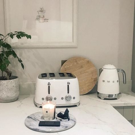 —@houseofaltair - _ a mouse in our house 🐭 #beatrixpotter #smegappliances #candle #kitcheninspo #kitchendesign #kitchenisland #kettle #toaster #art #watercolour #interiorstyling #homedecor #home #homedesign #kitchendecor - Kettle and toaster smeg_uk johnlewis - Paint 'Great White' (that is actually more of a pale pink) by farrowandball - Frame ikea that has been sanded down for a more rustic appearance - Marble board homesense_uk - Candle jomalonelondon - Chopping board shopmatalan Toaster Art, Kettle Toaster, Smeg Appliances, Kitchen Surface, Marble Board, Kettle And Toaster, Toasters, Art Watercolour, Beatrix Potter