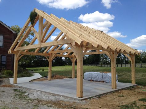 #kingpost #trusses #timberframe Wooden Carports, Timber Frame Plans, Timber Frame Pavilion, Diy Carport, Pavilion Plans, Carport Plans, Gazebo Plans, Timber Frame Construction, Backyard Buildings