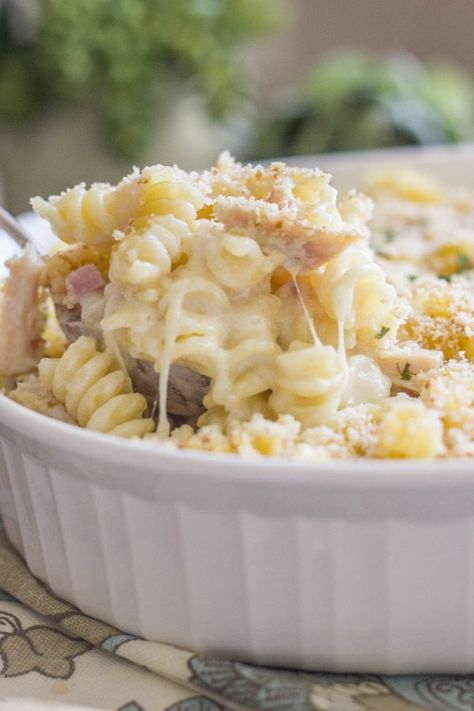 It's creamy pasta, melty swiss cheese, chicken, and ham all baked together and topped with homemade breadcrumbs. Add it to your menu this week! Swiss Cheese Chicken, Chicken Romano, Cordon Bleu Pasta, Homemade Breadcrumbs, Chicken Cordon Bleu Pasta, Yummy Casserole Recipes, Cheese Chicken, Chicken Cordon, Yummy Casseroles