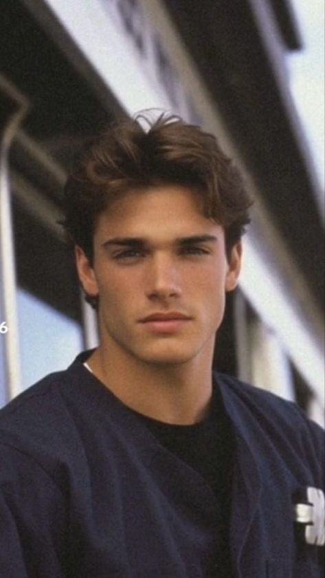 Top 50 Medium-Length Hairstyles for Men: Featuring Galleries and Videos | 50 of the Best Medium Hairstyles for Men (Gallery + Videos Included) 90s Mens Middle Part, Forward Mens Hairstyles, Medium To Long Length Haircut Men, Men’s Hair Styles Bangs, Thick Hairstyle Men, Choppy Mens Haircut, Men’s Short Middle Part, Mid Length Men’s Haircut, Mens Brushed Back Hairstyles