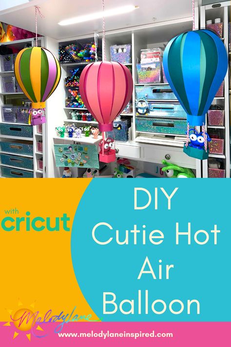 Create your own DIY Hot Air Balloon with your Cricut! Your Cricut Cutie can even ride in it! How To Make Paper Hot Air Balloons, Hot Air Balloon Svg Free, Hot Air Balloon Room Decor, Cricut Hot Air Balloon, Hot Air Balloon Cricut, Giant Hot Air Balloon Diy, Hot Air Balloons Craft, Diy Paper Hot Air Balloon, Diy Air Balloon Decorations