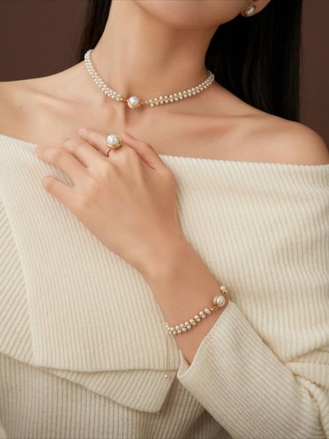 Introducing the COCOKIM Stargazer Choker. Timelessly elegant, it intertwines pearls and gold thread to create an everlasting allure. Fusing vintage charm with modern sophistication, pearls become the language of beauty, composing a poetic rhythm of elegance. Whether paired with professional attire or adding a touch of refinement to casual outings, you can always trust the timeless grace of the Classic Wrapped Series. Metal: 14k Gold Filled Pearl: Freshwater Pearls Chain Length: 350mm + 50mm adju Pearl Choker Bridal, Simple Pearl Choker Necklace Designs, Gold Choker With Pearls, Pearl Choker Wedding, Pearl Choker Set, Elegant Pearl Jewelry, Choker Necklace Designs, Fancy Jewelry Necklace, Pearl Jewelry Design