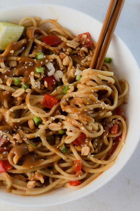 These Japanese Miso Peanut Noodles are a delicious easy weeknight dinner you can make in just 15 minutes with a creamy miso peanut sauce drizzled over tender Japanese udon noodles.Basic Ingredients udon noodles, red pepper, soy sauce, miso paste, sesame oil, peanut butter, rice vinegar, garlic, ginger, and more!Is miso gluten-free?Most miso paste is not inherently gluten-free because traditional miso paste is typically made from soybeans and grains like rice or barley, which may contain glute... Japanese Udon, Miso Paste, Peanut Noodles, Butter Rice, Udon Noodles, Easy Weeknight Dinner, Peanut Sauce, Easy Weeknight, Easy Weeknight Dinners