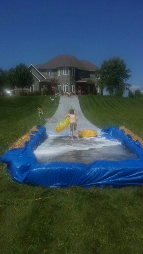 Homade slip and slide Diy Slip And Slide, Slip N Slide, Water Party, Backyard Playground, Yard Games, Backyard Games, Slip And Slide, Water Slide, Summertime Fun