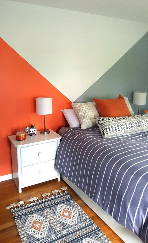 Bold patterned rug with neutral furniture. Blue And Orange Accent Wall, Colourful Boys Bedroom, Orange Boys Bedroom, Orange And Blue Bedroom, Yellow Boys Bedroom, Complementary Colour Scheme, Boys Bedroom Orange, Colorful Boys Room, Orange Bedroom Walls