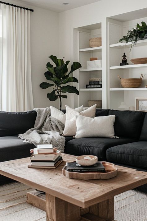 Gray Couches Decor, Couches Living Room Colors, Lounge Decor Black Sofa, Scandinavian Living Room Dark Couch, Black Couch Living Room Decor Apartment, Living Room Decor Dark Sofa, Black Couch With Pillows, Organic Modern Dark Couch, Grey Walls Black Furniture Living Room