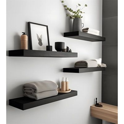 A simple design of floating shelves can make the most of an empty wall and make your room look prettier and neater. Can be used to add extra shelf space in bathroom, bedroom, kitchen, living room to store and organize small items. | Millwood Pines 48" Rustic Farmhouse Floating Shelf, Black Set Of 4 | Home Decor | C110623244 | Wayfair Canada Empty Wall Ideas Bedroom, Farmhouse Floating Shelf, Farmhouse Floating Shelves, Living Room Decor Pictures, Black Wall Shelves, Wall Shelves Living Room, Wall Decor Storage, Floating Shelves Bedroom, Handmade Cabinets