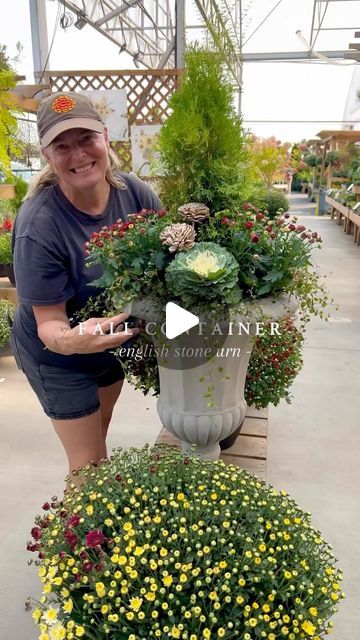 VANDULA FARMS on Instagram: "Elevate your patio with a stunning English urn filled with beautiful ornamental plants! 🤗 🍂 Easy to create and sure to make an impact, this timeless yet elegant container will wow your guests this Autumn season and beyond! 🎃  Follow along for container recipe: 👇✨  1Gal Thuga Occidentalis 'Jantar' 4" Chrysathemums 'Rust' x 3 4" Ornamental Cabbage x 3  4" Muehlenbeckia x 3 2 Faux Botanical Stems (optional)  16" Wickford Urn   #autumndecor #patioperfection #englishgarden #containergardening #fallplanting #vancity #vancouverisawesome #yvrlife #vancouverbc #deltabc #surreybc #richmondbc #burnabybc #coquitlambc #northvancouver #downtownvancouver #ubcvancouver" Ornamental Cabbage Planter Fall, Fall Container Ideas, Winter Plants For Pots Outdoors, Fall Urns For Front Porch, Porch Urns, Fall Urn, Fall Container Plants, Fall Flower Pots, Winter Containers