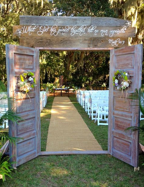 DIY door entrance to ceremony - they found old doors that they sanded and stained and built a frame (2 x 6 boards) and added handles.  They drove 15" rebar into the ground to secure it. They put ferns in front of the A frame support to hide it.  Added wreaths and sign above "What God has joined together let no man separate. Mark 10:9" Decorative Doors, Bridal Entry, Wedding Doors, Custom Doors, Rustic Country Wedding, Wedding Cake Designs, Wedding Wishes, Wedding Planners, Event Styling