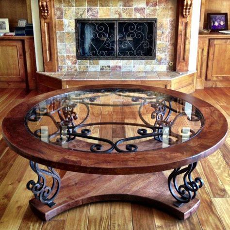 Wrought Iron Design, Iron Design, Glass Coffee Table, A Living Room, Entertainment Unit, Wrought Iron, Wood Floors, Fireplace, Coffee Table