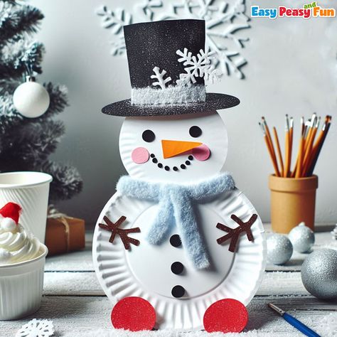 Paper plate snowman craft, Transform ordinary paper plates into adorable snowmen with this easy DIY craft. Your kids will love adding their personal touch to each snowman's unique personality. Let the winter crafting begin! Elementary School Winter Crafts, Snowman Paper Plate, Wall Decor On A Budget, Paper Plate Snowman, Valentine Craft Ideas, Beautiful Birthday Card, Snowman Crafts Diy, Craft Work For Kids, Snowman Craft