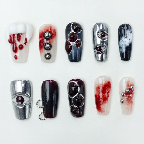 Get ready to haunt in style with our Halloween Collection! 🎃👻 From eerie cat eye gels to spooky claws, these designs are perfect for your ultimate Halloween look. Shop now and slay the season -- #donailsar #pressonnails #halloweennails #cateyegel #pressons #nails Conjuring Nails, Spooky Nail Designs Ideas For Halloween, Eye Ball Nails, Scary Nail Designs, Creepy Nail Art, Spooky Nails Halloween, Creepy Halloween Nails, Eye Nail Design, Scary Nail Art