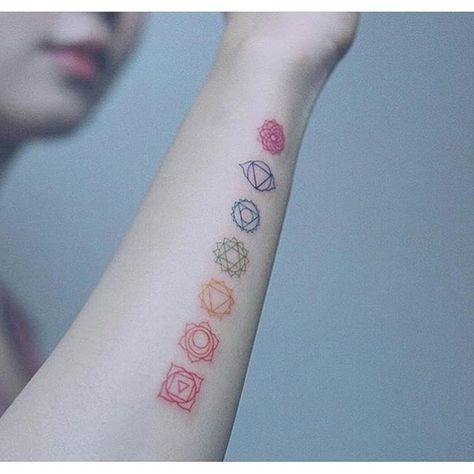 245+ Best Yoga Tattoos Designs and Ideas (2023) - TattoosBoyGirl Chakra Tattoo Forearm, Rainbow Chakra Tattoo, Simple Chakra Tattoo, Small Chakra Tattoos For Women, Chakra Tattoos For Women, Chakra Spine Tattoos For Women, Chakra Symbols Tattoo, Chakra Tattoo Design, Crazy Tattoo Ideas