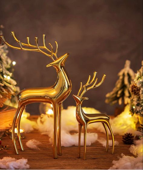 This beautifully made gold deer sculpture stand elegantly which gives a feeling of classic and elegance, suitable for any living space. Such as office, living room, bedroom,dining room, study, club, bookselfves, TV Stand and Mantle, ect. Set of 2. Small: 14cm/5.5”×4cm/1.6”×24cm/9.5”, Large: 20cm/7.9”×8cm/3.1”×34.5cm/13.6”. Reindeer Sculpture, Mantle Christmas, Gold Deer, Deer Statues, Reindeer Figurine, Gold Reindeer, Neutral Christmas Decor, Sculpture Stand, Christmas Mantle Decor