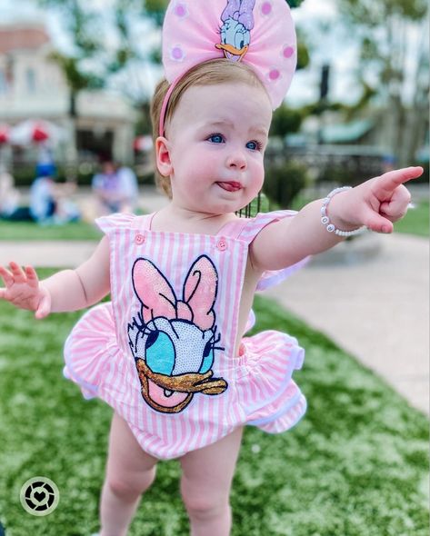 Disney world outfit for little girl, Daisy Duck pink romper, Daisy Duck Disney world bow for baby girl, Disney vacation kids outfit Follow my shop @zarahskelton on the @shop.LTK app to shop this post and get my exclusive app-only content! #liketkit #LTKtravel #LTKkids #LTKbaby @shop.ltk https://liketk.it/45Wpz One Year Old Disney Outfits, Baby Girl Disney Outfits, Baby Disney Outfits, Disney Baby Outfits, Daisy Duck Outfit, Disney Romper, Mom And Baby Costumes, Disney World Outfits Summer, Epcot Outfit Ideas