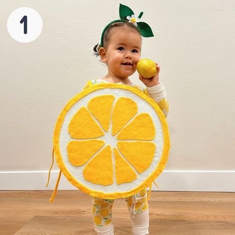 Solid Starts on Instagram: "Announcing the finalists for this year’s Solid Starts Halloween costume contest! 🎃 Thank you to everyone who posted and emailed in their submissions. We received hundreds of adorable photos of babies and toddlers in the most amazing food & food-related costumes. After a challenging selection process (so many creative costumes!) we were able to narrow it down to 10 of our favorites. And now it’s time to vote for yours! 🗳️To cast your vote: Comment below with the nu Diy Lemon Costume, Fruit Halloween Costumes Diy, Lemon Costume Diy, Fruit Costumes For Kids, Orange Fruit Costume, Broccoli Costume, Blueberry Costume, Fruit Halloween Costumes, Fruit Fancy Dress