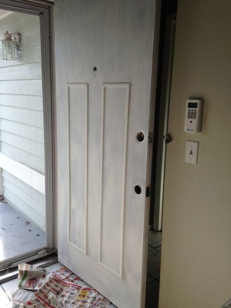 My front door was simply ugly. I'm not in a position to buy a new entry door; they are super expensive to buy, then install, so I tried to find a way to make my old, flat, ugly door more appealing. First, I sanded the door and patched what I could, then cleaned it. I cut some lightweight PVC moulding and made two frames, which I bonded to the door with an adhesive for PVC. I also ran some silicone around the frames to make a more finished look. I wanted to make the door look completel… Flat Panel Front Door Makeover, Flat Front Door Makeover, Front Door Repair, Exterior Door Update Diy, Front Door Update Diy, Entry Door Makeover, Exterior Door Makeover, Update Front Door, Door Update Diy