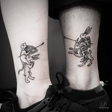 Matching couple tattoos of animal knights tattooed on ankles by Yi.postyism A Knights Tale Tattoo, Medieval Animal Tattoo, Mythical Animal Tattoo, Animal Matching Tattoos, Knight Traditional Tattoo, Medieval Style Tattoo, Animal Knight, Mythical Creatures Tattoo, Opposite Tattoos