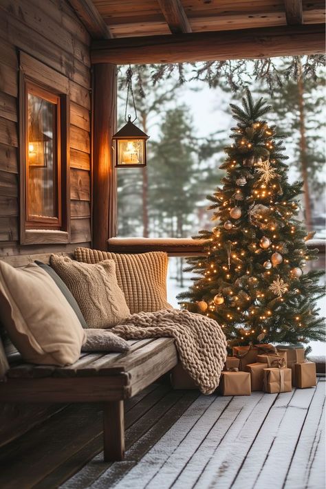 Can a porch feel festive with a calm, neutral vibe? I’d start with rustic lanterns for a warm glow, a throw blanket on a bench, and a vintage Christmas tree surrounded by kraft-wrapped gifts. This understated look blends seamlessly with the cozy charm of a rustic cabin. Ready to create your own serene holiday porch? Check out more ideas to get started! Rustic Cabin Christmas, Cozy Cabin Christmas, Cabin Home Decor, Cabin Christmas Decor, Dream Cabin, A Vintage Christmas, Rustic Porch, Wrapped Gifts, Log Cabin Decor