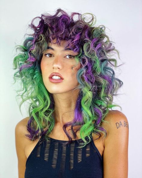 Mermaid Hair: Green and Purple Mix. A curly mix of purple and green strands. Click through for 45 mermaid hair ideas. #mermaidhair #haircolorideas #colorfulhair IG: @rebeccataylorhair Purple And Green Hair, Mermaid Hair Color, Dyed Curly Hair, 얼굴 드로잉, Colored Curly Hair, Copper Hair Color, Funky Hairstyles, Halloween Hair, Dye My Hair