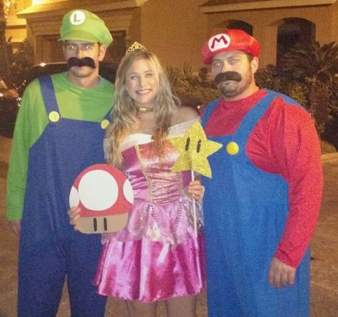 Mario, Luigi, princess peach sexy adult Halloween costume. Mario Luigi And Peach Costume, Mario And Luigi And Peach Costumes, Mario Trio Costume, Peach Mario Luigi Costume, Mario Luigi Princess Peach Costume Family, Mario Luigi And Princess Peach Costumes, Mario Luigi Princess Peach Costume, Princess Peach Mario And Luigi, Halloween Costumes Couples Mario And Princess Peach