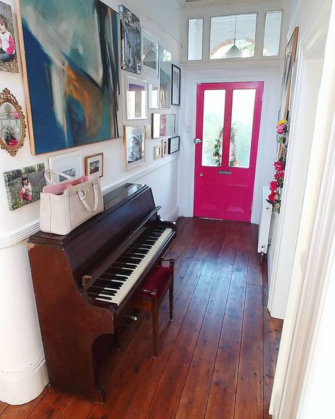 To those of you on Team Hot Pink - voila! First coat is on (same colour as the bath) and it's brought such a happy feel to the room. I've also hung loads of art, including our big abstract canvases, which we've had on the wall in 'temporary' 😅 places for the past seven years. The piano is going to be painted French grey with wallpapered sides - a genius idea sent to me via DM (if this was you let me know and I'll credit!). I remember stepping into this hallway for the first time ever when I ... Piano In Hallway, Piano Hallway, Hot Pink Door, Entry Foyer Ideas, Windsor House, Front Hallway, Piano Decor, Foyer Ideas, Pink Door