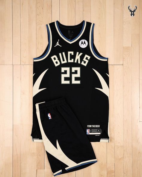 THE MILWAUKEE BUCKS HAVE UNVEILED THE TEAM’S NEW 2022-23 “FEAR THE DEER” STATEMENT EDITION UNIFORM. THIS IS THE THIRD EDITION OF THE “FEAR THE DEER” SERIES OF THE BUCKS. THE NEW DESIGN FEATURES A BLACK BASE COLOR WITH CREAM ANTLERS RUNNING UP THE SIDES OF RITE SHORTS AND JERSEY. Basketball Jersey Design Ideas Sports, Zapatillas Nike Basketball, Basketball Logo Design, Basketball Jersey Outfit, Nba Uniforms, Basketball Uniforms Design, Sport Shirt Design, Sports Jersey Design, Dancers Outfit