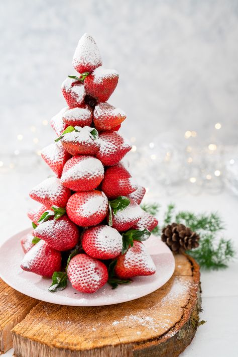 Get in the holiday spirit by creating a strawberry Christmas tree. #christmas #christmastree Strawberries, Christmas Tree, Fruit, Christmas