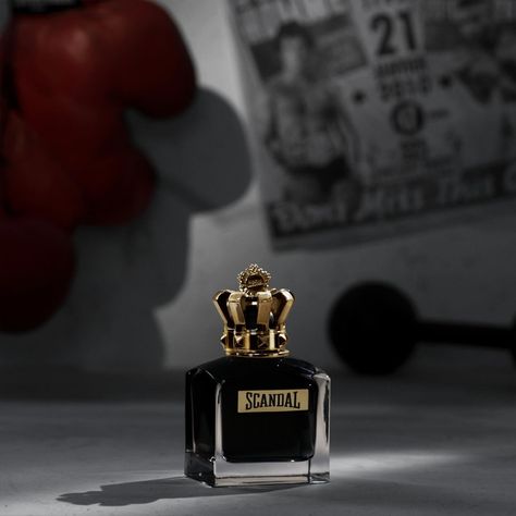 The show must go on! The legend of the ring is back. With a new eau de parfum intense featuring an even sexier and more outrageous punch. This gold-crowned champion with his black lacquered charisma will knock you out with the first spray of woody amber fragrance. Victory is guaranteed. 🥊 Find it in-store & online! #GaleriesLafayettedubai #jeanpaulgaultier Jean Paul Gaultier Scandal, Show Must Go On, Look Jean, Tonka Bean, Paul Gaultier, Mens Fragrance, Jean Paul, Jean Paul Gaultier, Sale Event