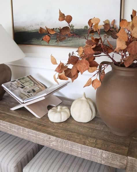 Fall console table decor - the only thing I changed here were the stems and the swapped a candle for the pumpkins 🍂 🍂visit the link in bio to shop this space Have a wonderful day! . . Fall decor, seasonal home decor, fall stems, console table decor, pottery barn home, McGee and co, target home Fall Console Table Decor, Fall Inspired Living Room, Style A Living Room, Simple Console Table, Pottery Barn Home, Room Console Table, Fall Stems, Living Room Console Table, Console Table Decor