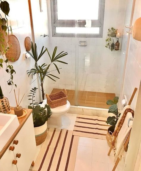 16 Boho Bathroom Ideas: Embrace the Chic and Cozy Aesthetic - StoryNorth Apartment Inspiration Boho, Bathroom Plant Decor, Bathroom Plant, Bathroom Plants Decor, Boho Bathroom Ideas, Pebble Floor, Airstream Remodel, Green Oasis, Life Color