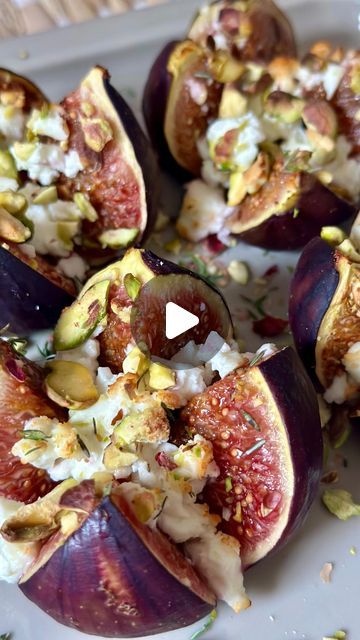 Dorina | Healthy Cooking on Instagram: "Juicy figs, salted feta cheese, fresh thyme, crunchy pistachios and sweet honey makes this quick snack or elegant appetiser.

This recipe is so simple, it takes just a few minutes to make!

Ingredients:

-4 fresh figs
-3 tablespoons crumbled feta cheese
-20 g chopped pistachios 
-fresh thyme
-honey

Instructions:

1. Cut off stem and make a cross over the top of the figs. Leave the base connected but slightly open them.
2. Tuck in the crumbled feta, sprinkle with chopped pistachios and fresh thyme.
3. Cook in the air fryer at 180°C/ 356°F for 5 minutes. Or you can bake them in the oven for 10 minutes at 200°C/392°F.
4. Drizzle with honey and serve. Enjoy!

#figs #inseason #fall #appetizers #deliciousfood #recipes #easyrecipes #healthyeating" How To Serve Fresh Figs, Quick Starters Recipes, Fig Recipes Appetizers, Fresh Fig Recipes Simple, Fig And Cheese, Figs Recipes, Appetizer Fruit, Fig Appetizer, Thyme Honey