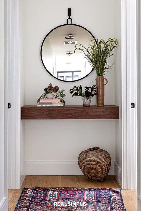 11 Hallway Decor Ideas to Elevate Your Space | Designer Becky Shea says a hallway is a perfect place to display a collection of items that are uniquely you. "Selecting items that subtly hint at your aesthetic in a pared-back manner is quintessential in achieving a look that feels thoughtfully curated," Shea explains. #homedecorideas #realsimple #decor #homeinspiration #detail End Of Hallway Accent Wall, End Of Hallway Decor, Small Hallway Decorating, End Of Hallway, Decorating Hallways, Narrow Hallway Ideas, Small Wall Decor, Narrow Hallway Decorating, Hallway Design