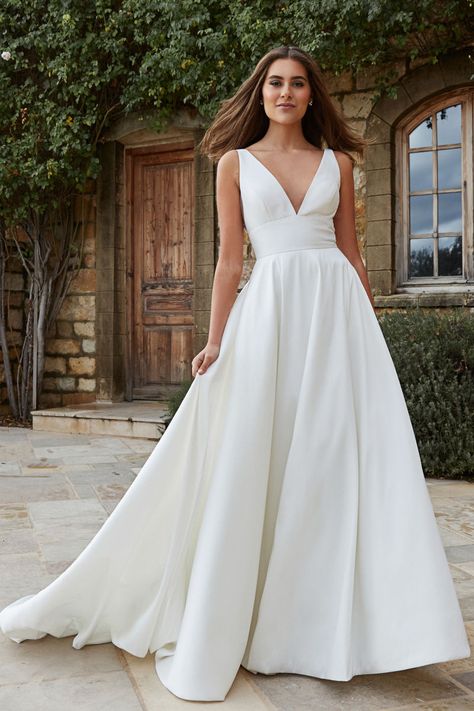 Backless minimalist taffeta ballgown with a defined waist, pockets. Classic Aline Wedding Dress, Corset Under Wedding Dress, Cold Shoulder Wedding Dress, Carlson Young, Asymmetrical Wedding Dress, Wedding Dresses Near Me, Mori Lee Wedding Dress, Wedding Dress Silhouette, Navy Blue Bridesmaid Dresses