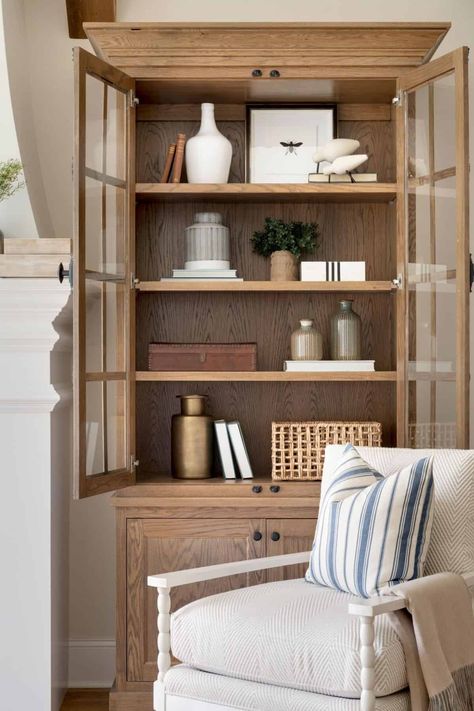 Minnesota lake house features the perfect blend of modern and traditional Book Shelf Styling, Shelf Decor Living Room, Hutch Decor, Bookcase Styling, Bookcase Decor, Bookshelf Styling, Glass Cabinet Doors, Bookshelf Decor, Lake Home