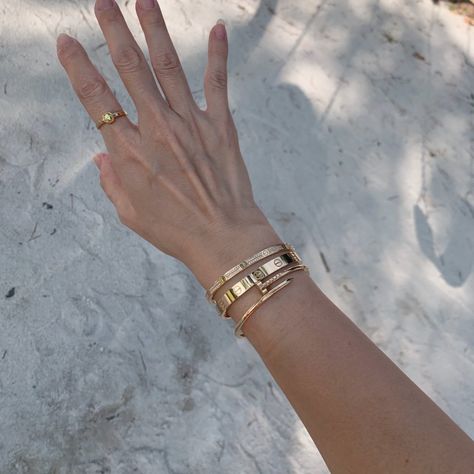 Layering and Stacking Thread! | PurseForum Cartier Love Bracelet Stack Ideas, Wrist Jewelry Stack, Cartier Wrist Stack, How To Layer Bracelets With A Watch, Gold Bracelet Layering, Cartier Love Cuff Bracelet, Gold Bangle Stacking Ideas, Bracelet Layering Ideas Gold, How To Stack Bracelets With Watch