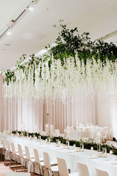 Most Magical Hanging Floral Installation With Fairy Lights ~ loving this display by Stems Floral Design + Production featuring fairy lights and hanging white wisteria Hanging Flowers Wedding, Wisteria Wedding, Beautiful Wedding Centerpiece, Vine Decoration, Flower Ceiling, Wedding Ceiling, Table Centerpiece Decorations, Arch Decoration Wedding, Hanging Garland