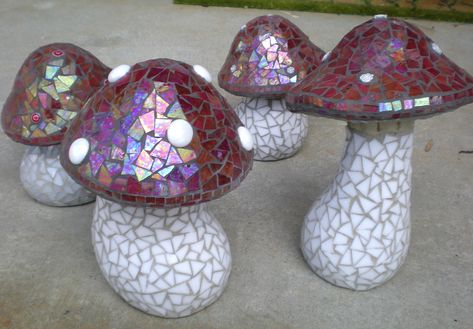 My crop of mosaic mushrooms Mosaic Mushrooms, Mushroom Garden Art, Concrete Mushrooms, Art Mushrooms, Mushroom Garden, Stepping Stones Diy, Mosaic Pots, Mosaic Garden Art, Diy Mosaic