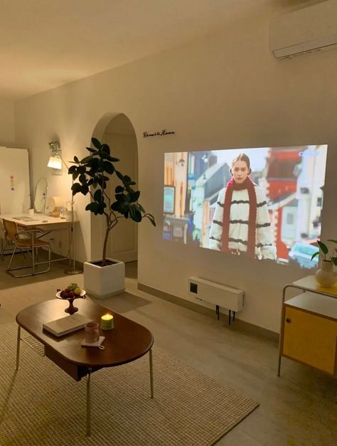 Projector In Studio Apartment, Living Room Designs With Projector, Nordic Studio Apartment, Nyc Studio Apartment Ideas Small Spaces, No Wall For Tv In Living Room, Projector Living Room Set Up, Room With A Projector, Small Living Room Projector Ideas, Projector In Apartment