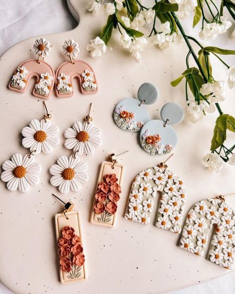 Noelle Earrings on Instagram: "my most favorite collection of all time ✨🌿🌼🌷🌞 launching this Friday at 6 PM EST! Which style is your fave so far? I shared almost every style I’ve made so far to my stories, so head there to see the full collection! #polymerclay #polymerclayearrings #polymerclayartist #polymerclaycreations #clayearrings #polymerclayjewelry #smallbiz #smallbizowner #smallbusinessowner #shopify #shopifyseller #smallbusiness #shopsmall #smallbusinesssupport #youngbusinessowner #bo Cute Earrings Polymer Clay, Polymer Clay Small Business, Popular Polymer Clay Earrings, Sculpy Earrings Diy, Earrings Made Of Clay, Spring Polymer Clay Earring Ideas, Clay Earrings Spring, Earring Polymer Clay, Clay Earring Inspiration