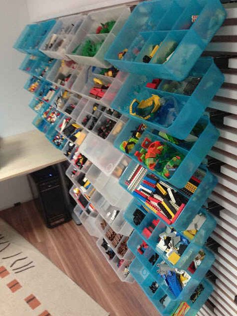 Lego loving kids will flip over this wall storage, too. | 23 DIY Projects That Will Blow Your Kids' Minds Lego Wall Storage, Ikea Mandal Headboard, Ikea Mandal, Table Lego, Lego Table With Storage, Lego Organization, Lego Wall, Lego Table, Lego Room