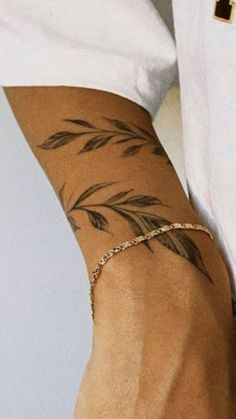 Leaf Tattoos Arm, Mens Leaves Tattoo, Leave Tattoo Men, Leaves On Arm Tattoo, Leaf Tattoo On Arm, Vine Arm Tattoo Men, Tattoo Leaves Arm, Wrap Around Arm Tattoos For Men, Tattoos Men Aesthetic