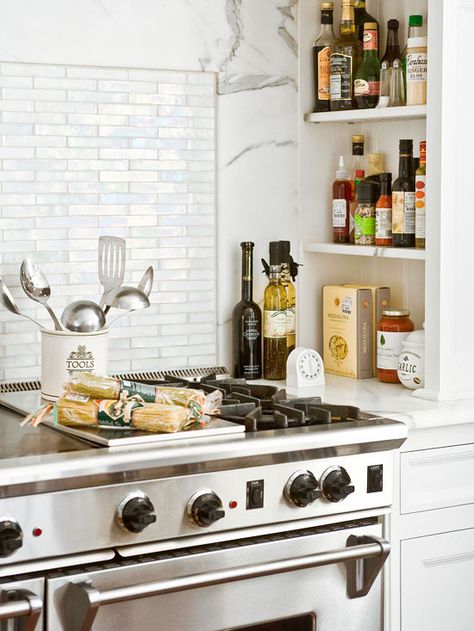 Nifty Storage Niche :: A niche built into the range alcove creates the perfect spot to stow away everyday cooking items such as spices, condiments, and cooking oils. Create similar storage elsewhere in the kitchen by building shelves between wall studs. | via BHG Unfitted Kitchen, Clever Kitchen Storage, Kitchen Stove, Classic Kitchen, Smart Kitchen, Dream Kitchens, Decoration Inspiration, The Design Files, Kitchen Reno