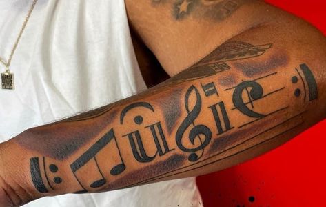 Piano Tattoo Ideas For Men, Starter Tattoos Ideas Women, Music Arm Tattoo, Musical Tattoos For Guys, Highly Favored Tattoo, Music Sheet Tattoo, Music Sleeve Tattoo, Arm Tattoos Music, Music Tattoo Ideas For Men