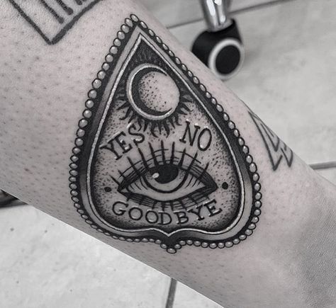 Ouija Planchette Tattoo Traditional, American Traditional Planchette Tattoo, Ouji Tattoos, Small Planchette Tattoo, Planchet Tattoo, Oujia Board Tattoos, Spooky Hand Tattoos, Coffin Tattoo Ideas, Ouija Planchette Tattoo