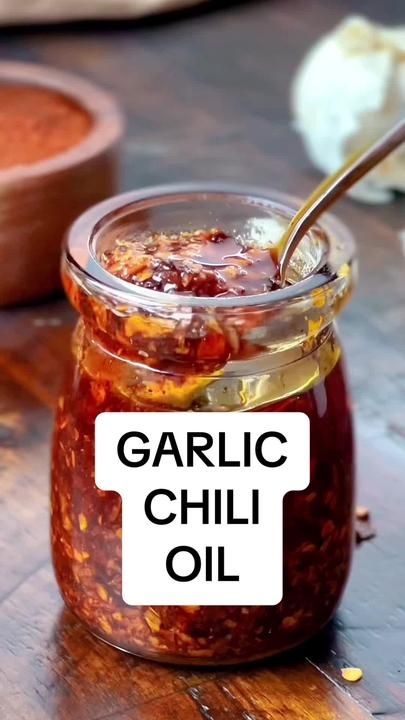 There is a link in my profile for homemade Garlic Chili Oil! #iamhomes... | Chili Oil | TikTok Garlic Oil Recipe, Garlic Chili Oil, How To Make Chilli, Chili Oil Recipe, Homemade Chili Recipe, Homestead Recipes, Garlic Sauce Recipe, Homemade Sauce Recipes, Homemade Condiments