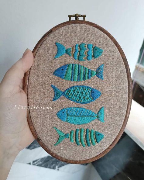 Albert Einstein once said “If you judge a fish by its ability to climb a tree, it will live its whole life believing that it is stupid.” 🩵💚 Hoop size is 19*15cm Embroidered by Anchor threads (made in India) Used a beige Indian linen fabric Putting in golden stitches to be a touch on it. For more details please send me a message 🩵💚 #Floraliconss #embroidery #cotton #egyptiandesigners #egyptianmaker #wallart #فلورال_آيكونز #madeinegypt #كونوا_مبدعين #anchorthreads Fish Embroidery Designs, Embroidery Fish, Climb A Tree, Fish Embroidery, Peacock Embroidery, Anchor Threads, Embroidery Stitches Tutorial, Embroidery Cotton, Ocean Inspired