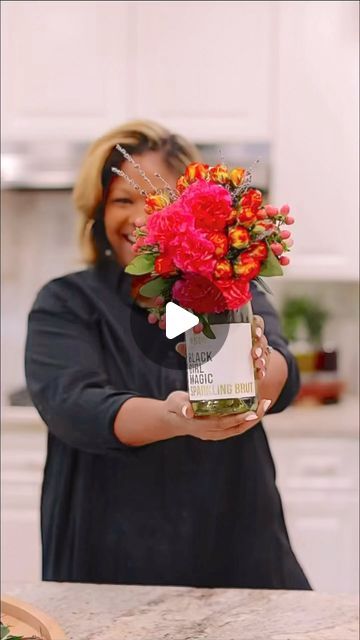 Rosalynn Daniels on Instagram: "Wine Bottle Bouquets for the win!! Tag me if you make one!

Cheers to all the amazing moms and dads out there! If you're still hunting for the perfect Mother's Day gift, might I suggest wine bottle bouquets? Not only are they incredibly easy to make, but they also create a stunning statement piece that any mom or Dad would appreciate.

All you need are 3 different types of flowers, flower foam, plastic wrap, ribbon, and a skewer. 

💐Spray your foam with water or submerge in water.

💐Cut a small piece of flower foam to fit your bottle neck, create a hole with the skewer, thread the ribbon through, attach the foam to the front of the bottle, and tie a bow to secure it in place. 

💐Then, cut your flowers and add them to the foam. Voila! 

You now have a beau