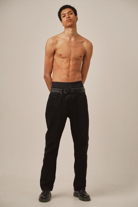 A skinny lightskin model posing in a studio for polaroids. Shirtless, wearing only a black pants and black shoes. Body Reference Real Life, Fullbody Pose References Man, Shirtless Male Model Reference, Front Poses Reference, Full Body Man Reference, Normal Male Body Reference, Half Body Poses Men, Neutral Pose Reference Male, Male Model Full Body Reference